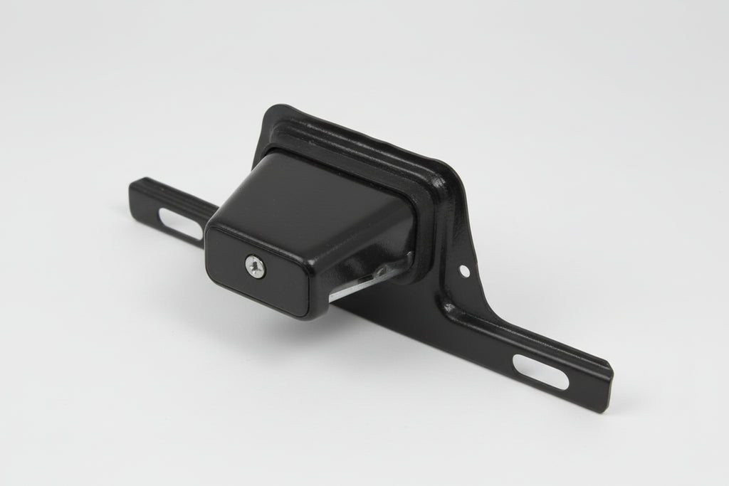 Black metal license plate holder on a white background