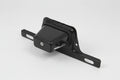 Black metal license plate holder on a white background