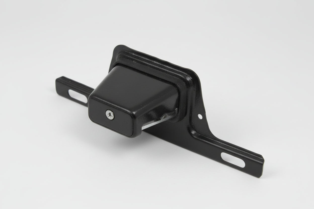 Black metal license plate holder on a white background